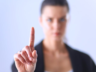 Woman touching an imaginary screen with her finger