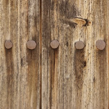 Old Wood Plank Panel With Forged Rusty Iron Nails Texture