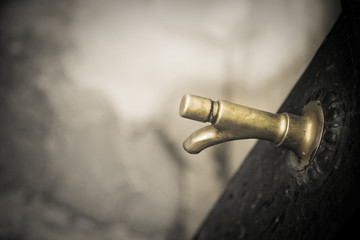 Detail of a fountain in a park - image with copy space