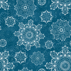 Vector seamless pattern with snowflakes. Christmas decorative elements for winter design.