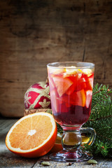 Christmas composition with mulled wine with orange, fir branches