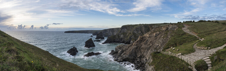 Fototapeta na wymiar Stunning landcape image of Bedruthan Steps on Cornwall coast in