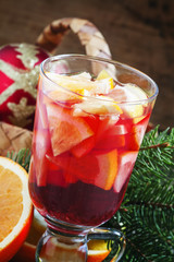 Christmas composition with mulled wine with orange, fir branches