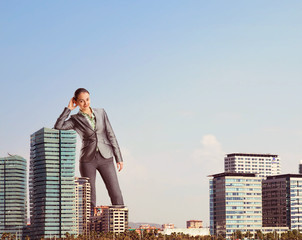 Giant businesswoman
