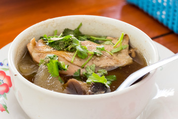 Chicken soup with Pickled lemon in cup..Thai food