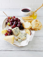 breakfast composition with cheese and grapes