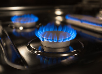 Closeup shot of fire from gas kitchen stove