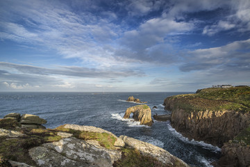 Stunning sunrise landscape image of Land's End in Cornwall Engla