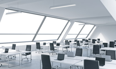 Workplaces in a bright modern open space loft office. White tables equipped by modern laptops and black chairs. White copy space in the panoramic windows. 3D rendering.