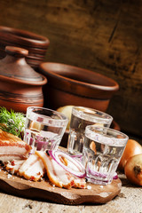 Vodka with spicy red onion, bacon and pepper, Russian tradition,