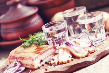 Vodka with spicy red onion, bacon and pepper, Russian tradition,