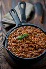 Close-up of bolognese sauce in a frying pan, selective focus