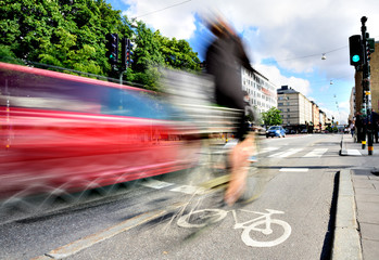 Motion blurred bike and other traffic