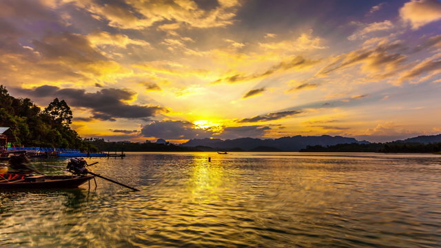 Timelapse Heavenly Sunset. Cheow Lan Lake or Rajjaprabha Dam Reservoir, Thailand