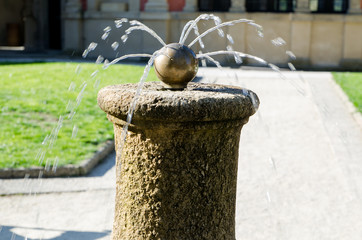 Water flowing from the fountain