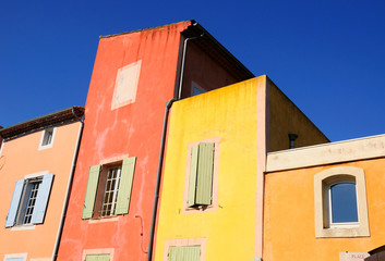 Multicolored residential house in a french village.