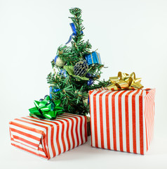Christmas presents with christmas tree isolated