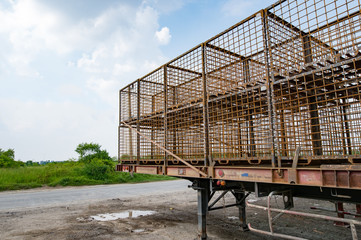 Rust metallic cage on trailer