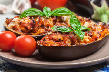 Baked eggplant with pieces of chicken