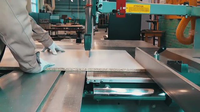 Sliding table saws woodworking machine for cutting of panels on furniture plant. 