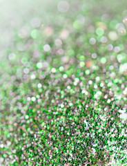 Holiday abstract green glitter background with blinking stars