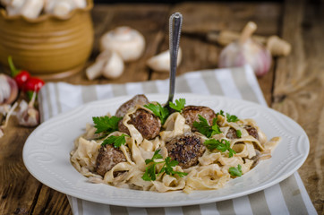 Homemade tagliatelle with meat balls