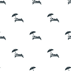 Man lying at beach chair icon