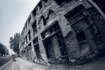 Abandoned building on Outer Ring Road. Majnu Ka Tilla, Delhi, India