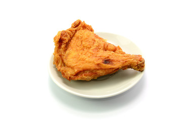 white plate with crispy fried chicken on white background