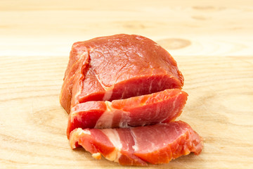 Sliced Meat on wooden background