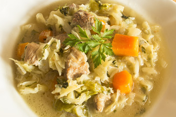 Boiled cabbage with pork and vegetables