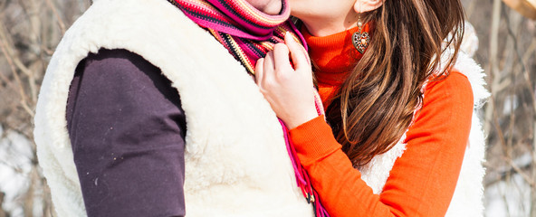Fototapeta na wymiar Young couple hugging r in winter weather