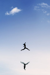 Fototapeta na wymiar Woman enjoy vacation and jumps on the sky