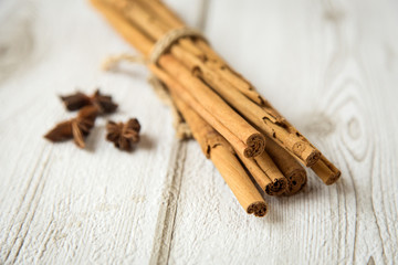 Cinnamon sticks tied with a rope with star anise