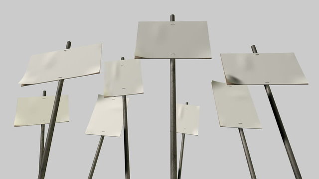 An animated view of a set of nine blank, white picket placards attached to wooden stakes moving up and down randomly on an isolated background