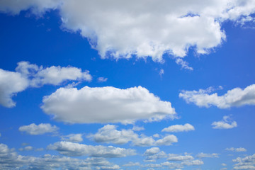 Naklejka na ściany i meble Blue sky with clouds in a summer day