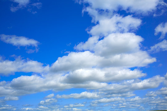 Blue sky with clouds in a summer day