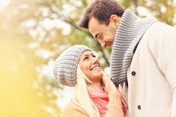 Young romantic couple in the park in autumn © Kalim