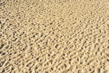 view to sand on beach as textured background