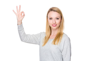 Fototapeta premium Caucasian young woman with ok sign geature
