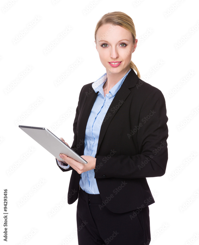 Wall mural businesswoman use of the digital tablet pc