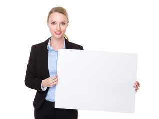 Caucasian businesswoman show with white banner