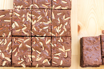 Slices of almond chocolate brownie cake