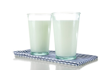 Glasses of milk, isolated on white