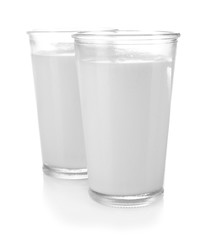 Glasses of milk, isolated on white