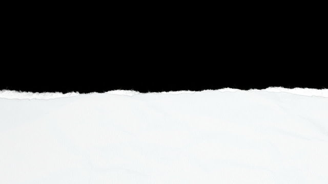 A top view of a white textured piece of paper that has a rectangular section torn out out of the middle of it revealing a black background