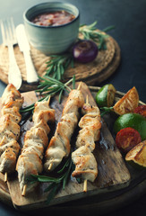 Chicken skewers grilled with sauce