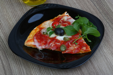 Pizza with salami and mozzarella