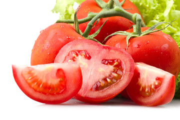 Red tomato and drops water close up