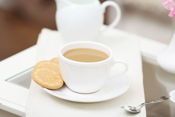 Cup of coffee on table close up